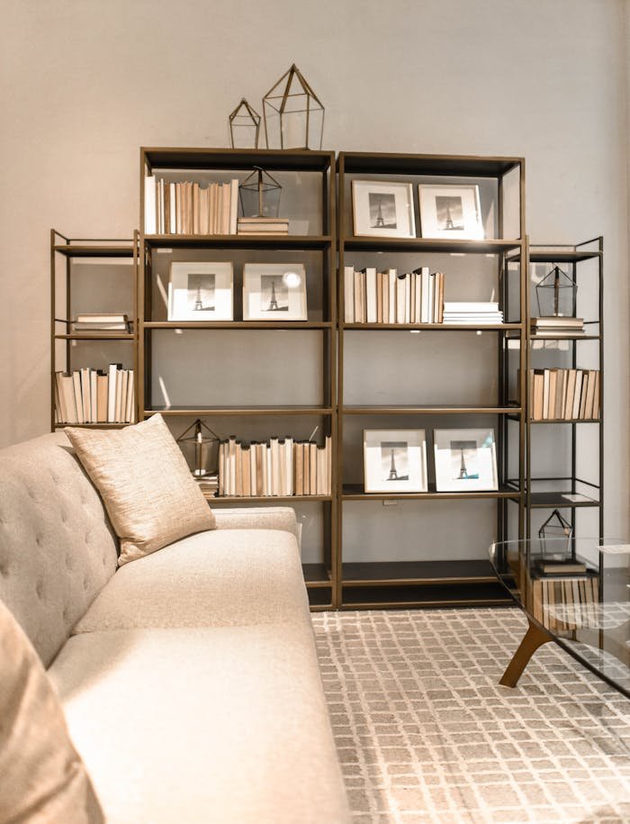 Crafting Captivating Headlines: Your awesome post title goes here A stylish modern living room featuring bookshelves with decor and a comfortable sofa. Ideal for interior design inspiration.